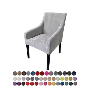 May include: A gray upholstered armchair with black wooden legs. The chair has a high back and arms. The chair is shown against a white background. The image also shows a variety of fabric swatches in different colors and patterns.