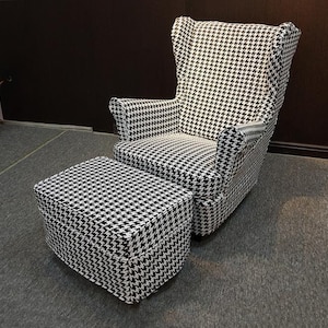 May include: A black and white houndstooth patterned armchair with a matching ottoman. The chair has a high back and wing arms. The ottoman is square and has a tufted top.