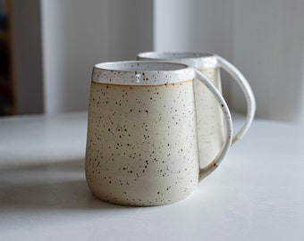 Tea mug, beige and glossy white with dots