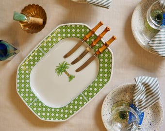 Vintage serving plate with palm tree and Viennese cane frame