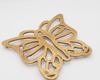 Vintage vlinderonderzetter