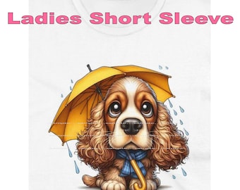 DigiPups Cocker Spaniel Dog Breed Puppy In The Rain Umbrella And Raincoat Funny Cartoon Graphic Art Short Sleeve Ladies T Shirt
