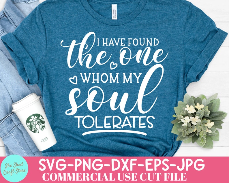 May include: Teal t-shirt with the text "I HAVE FOUND the ONE WHOM MY SOUL TOLERATES" in white script. A coffee cup and a small floral arrangement are visible. The shirt is folded, and the words "SVG-PNG-DXF-EPS-JPG COMMERCIAL USE CUT FILE" are at the bottom.