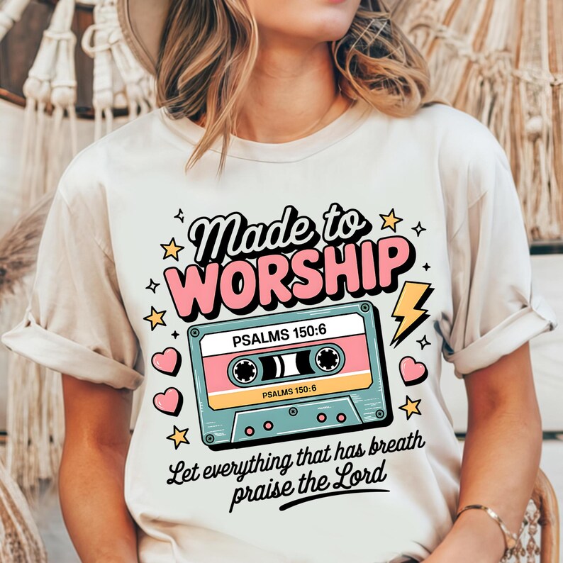 May include: A white t-shirt with a retro cassette tape design and the text "Made to Worship" in pink. The cassette tape has the text "Psalms 150:6" on it. Below the cassette tape is the text "Let everything that has breath praise the Lord."