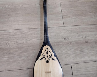 Kids toy Dombra a national musical instrument of the Kazakhs