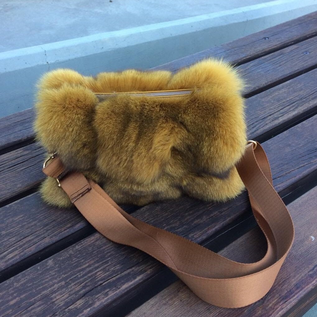 Yellow fur bag sale