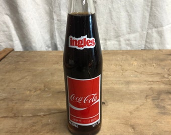 10 OZ COCA COLA COMMEMORATIVE BOTTLE - 1985 INGLES 100TH STORE OPENING