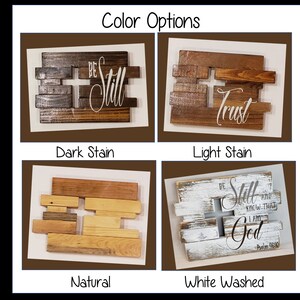 May include: Four wooden signs with different stain colors: dark stain, light stain, natural, and white washed. The signs feature the words "Be Still", "Trust", and "Be Still and Know That I Am God".
