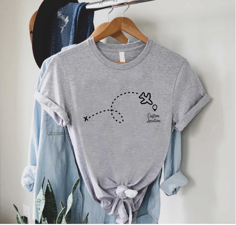 a t - shirt hanging on a clothes rack