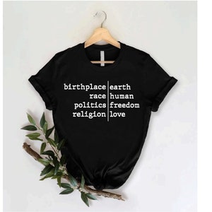 a black t - shirt with white words on it