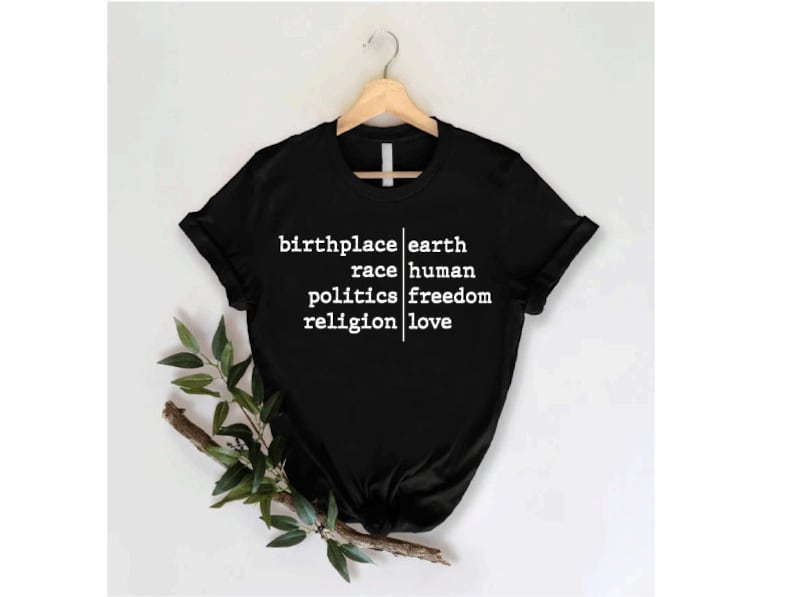 a black t - shirt with white words on it