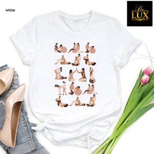 a white t - shirt with a picture of a woman doing yoga