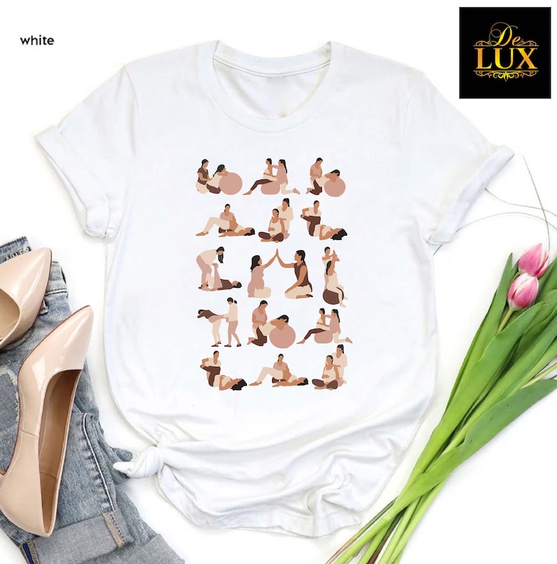 a white t - shirt with a picture of a woman doing yoga