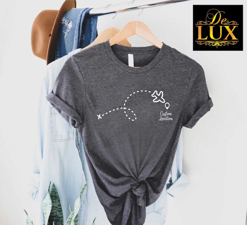 a t - shirt hanging on a clothes rack