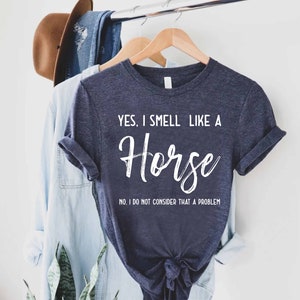 a t - shirt that says yes i smell like a horse
