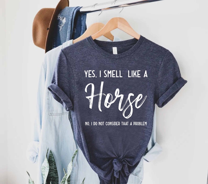 a t - shirt that says yes i smell like a horse