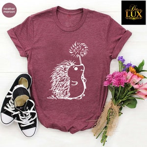 a t - shirt with an image of a hedge on it