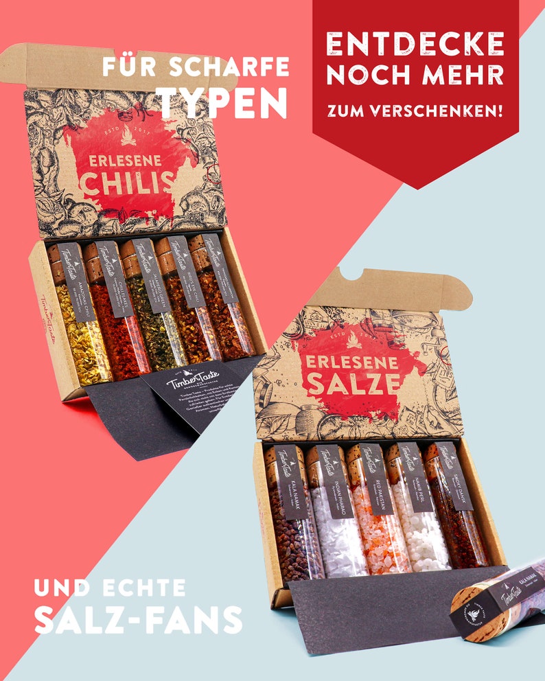 May include: Two open boxes with a variety of small glass jars filled with spices. The top box contains chili flakes and the bottom box contains salts. The boxes are brown with a vintage design and the text "ERLESENE CHILIS" and "ERLESENE SALZE" on the front.