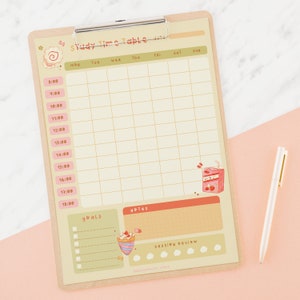 May include: A printable weekly study planner with a pastel color scheme. The planner has a grid for scheduling study time, a section for goals, and a section for notes. The planner is decorated with cute illustrations of food and drinks.