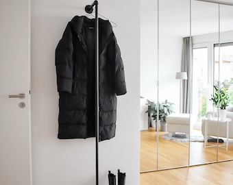 Wall mount clothing rod • made of industrial water tubes • perfect for the entrance area to hang jackets or coats • FRED