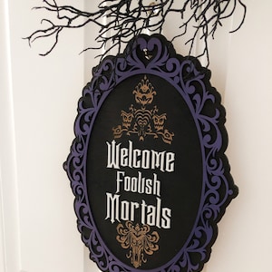 Welcome Foolish Mortals wood door hanger or wall decor