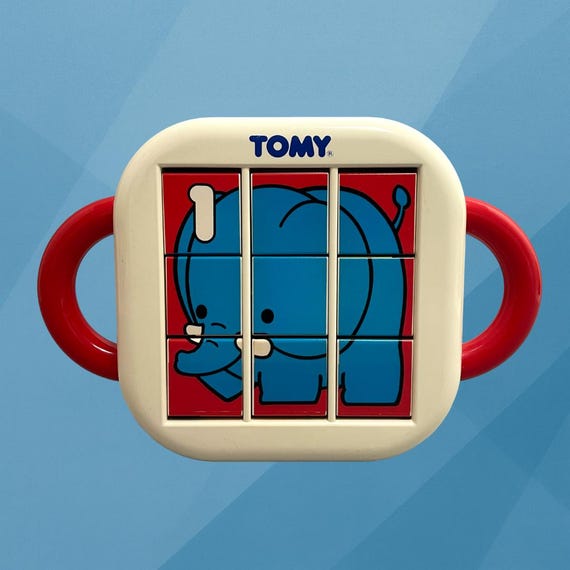 ヴィンテージ TOMY 3D ベビーパズル、アウェイクニングトイ (1992