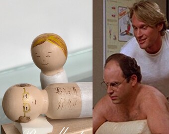 George Costanza recibe un masaje de Raymond.