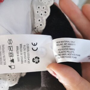May include: A white tag with black text listing the materials used to make the product. The tag reads "All new materials: Polyester fiber, plastic pellets, ethylene vinyl acetate foam, polyurethane foam. Made in Vietnam.  Fab-050458-16216. GRC#010317010012. CE". A second tag reads "New material only. Reg No. 0BT-00602111. Content: Polyester fibres, plastic pellets, ethylene vinyl acetate foam, polyurethane foam."