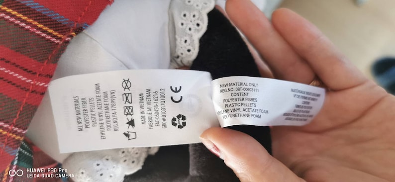 May include: A white tag with black text listing the materials used to make the product. The tag reads "All new materials: Polyester fiber, plastic pellets, ethylene vinyl acetate foam, polyurethane foam. Made in Vietnam.  Fab-050458-16216. GRC#010317010012. CE". A second tag reads "New material only. Reg No. 0BT-00602111. Content: Polyester fibres, plastic pellets, ethylene vinyl acetate foam, polyurethane foam."