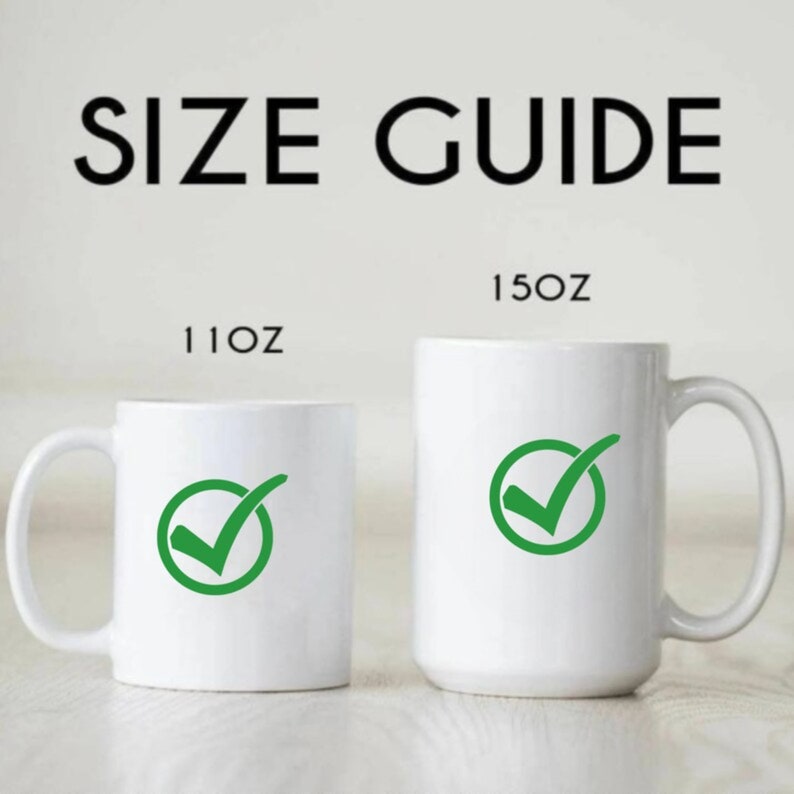 May include: Size guide for mugs, showing a 11 oz mug and a 15 oz mug. Both mugs are white with a green checkmark in a circle.