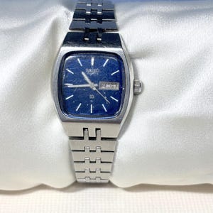Vintage 1977 Seiko Quartz Watch Womens Square Blue Dial Silver Tone 6&quot; New Battery Day Date