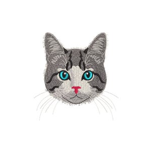 May include: Embroidered cat face with gray and white fur, blue eyes, and a pink nose. The cat's whiskers are visible, and the design is set against a white background. This design is suitable for various craft projects.