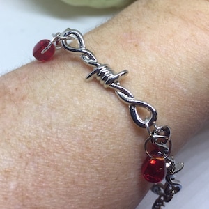 Barbed wire bracelet with blood drip beads