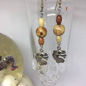 Wood bead dragon dangle earrings