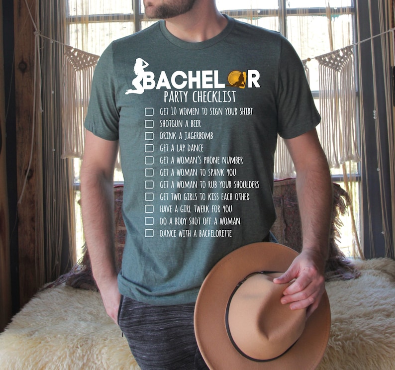 May include: A green t-shirt with a white graphic that says "Bachelor Party Checklist" and lists a humorous checklist of things to do at a bachelor party.