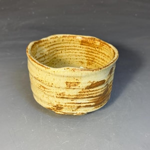 Stoneware Tea Bowl (Chawan) with Yellow Glaze and Wavy Rim