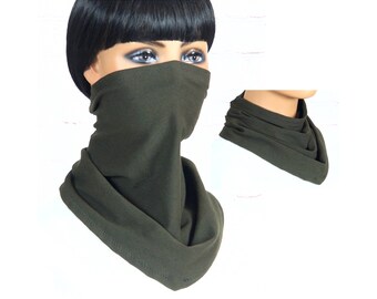 May include: A dark green neck gaiter made of soft fabric. The gaiter can be worn as a face mask, neck warmer, or headband.