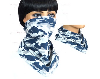 May include: A blue and white camouflage neck gaiter. The gaiter is made of a soft, stretchy fabric and can be worn as a face mask, neck warmer, or headband.