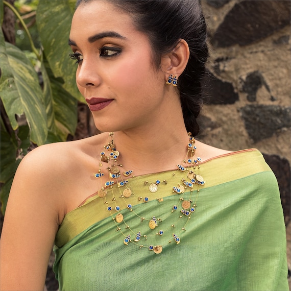 Statement jewellery deals with saree