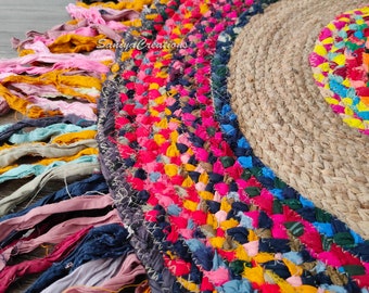 Alfombra Chindi de yute trenzado hecha a mano: Alfombra redonda de estilo bohemio multicolor.