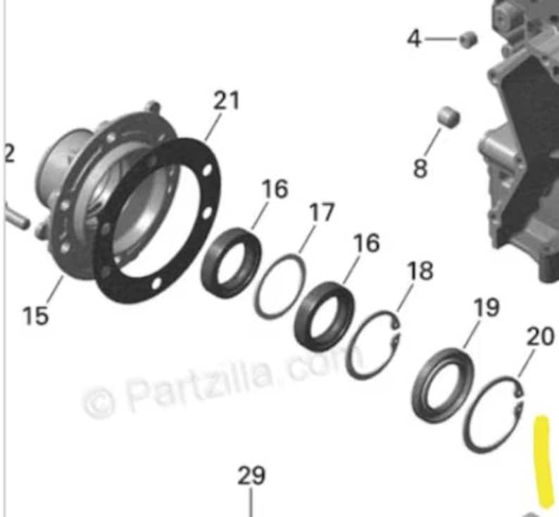 May include: An exploded diagram of mechanical components, including a circular flange, seals, and retaining rings. The parts are arranged against a white background, with labels indicating part numbers.