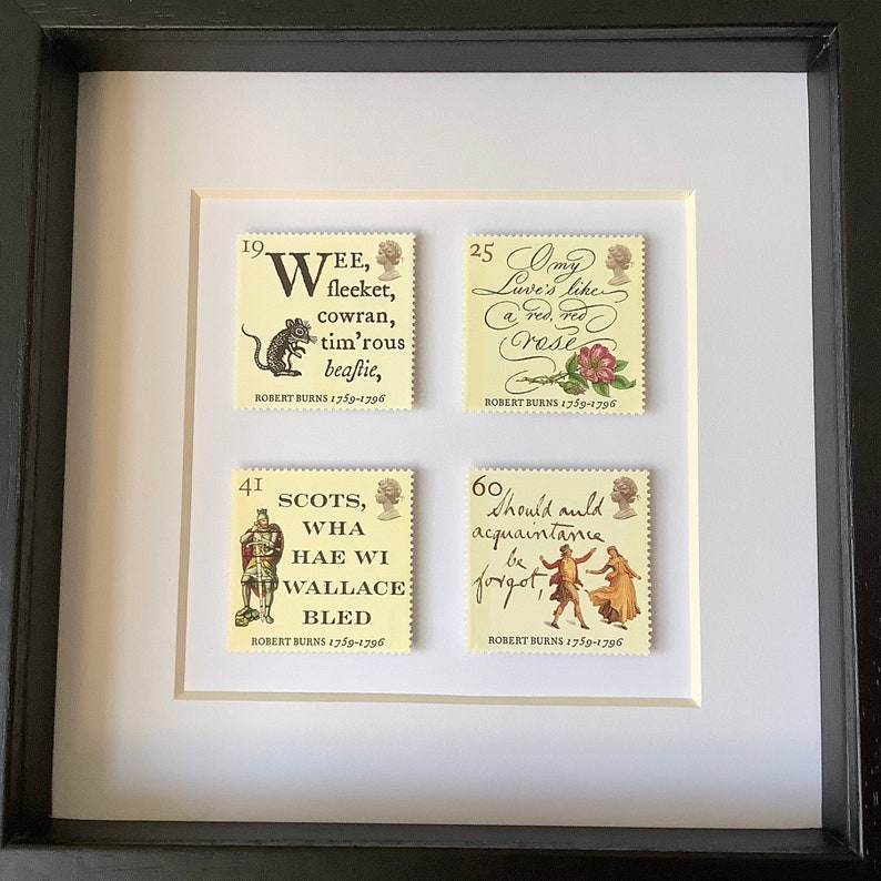 May include: Four vintage postage stamps featuring quotes from Robert Burns, the Scottish poet. The stamps are framed in a black frame with a white mat. The stamps are yellow with black text and illustrations.