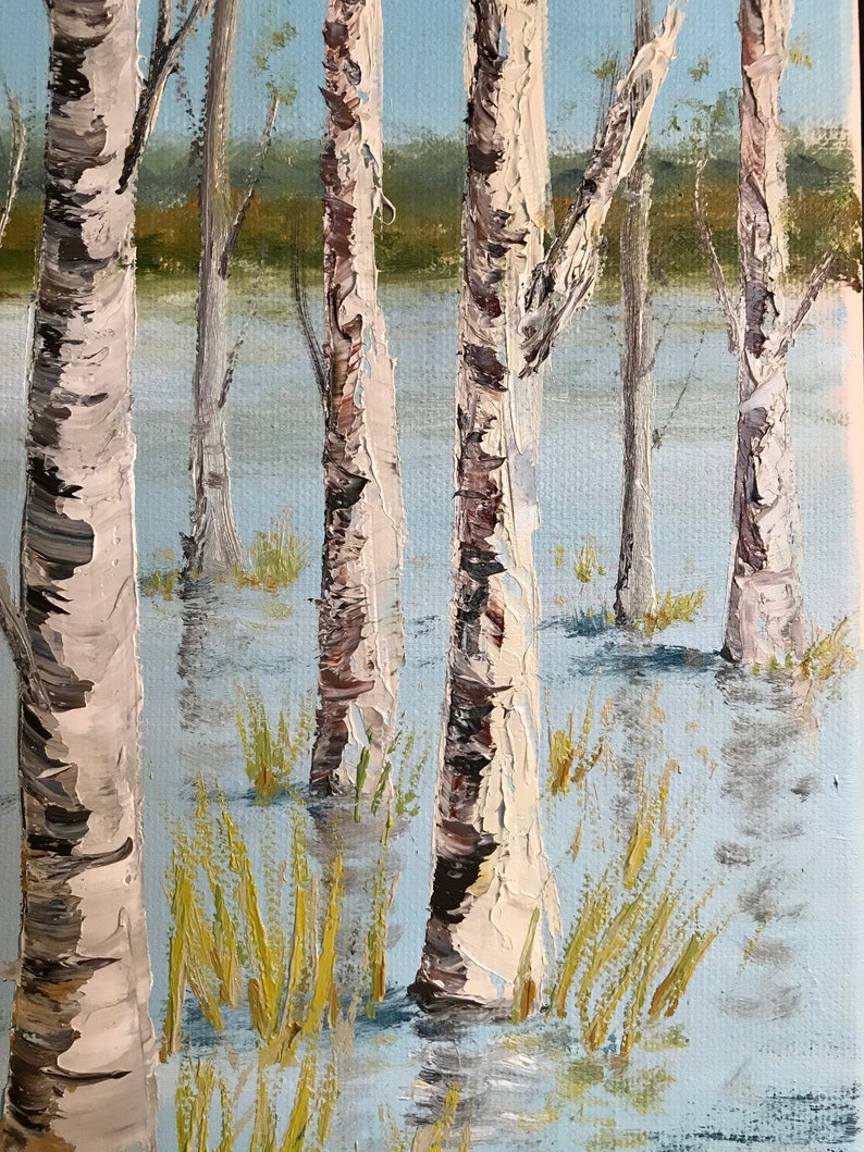 May include: A painting of a birch tree forest with white bark and brown branches. The trees are standing in a shallow body of water with green grass growing around them. The background is a blue sky with white clouds.