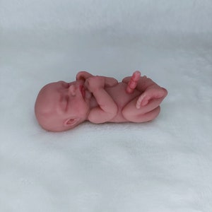 Bebé de silicona en miniatura imagen 4