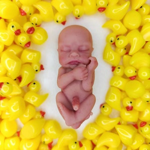 Miniature silicone baby