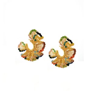 May include: A pair of gold hoop earrings with colorful beads. The earrings are made of wire and have a delicate, intricate design.