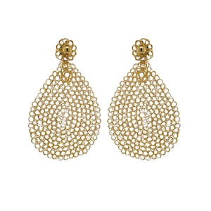 May include: A pair of gold teardrop-shaped earrings with a delicate chainmail design. The earrings have a small flower-shaped detail at the top.