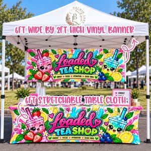May include: A 6ft wide by 2ft high vinyl banner and a stretchable table cloth featuring a colorful graphic of two cartoon tea cups with faces, strawberries, blueberries, and lemon slices, with the text Loaded Tea Shop.