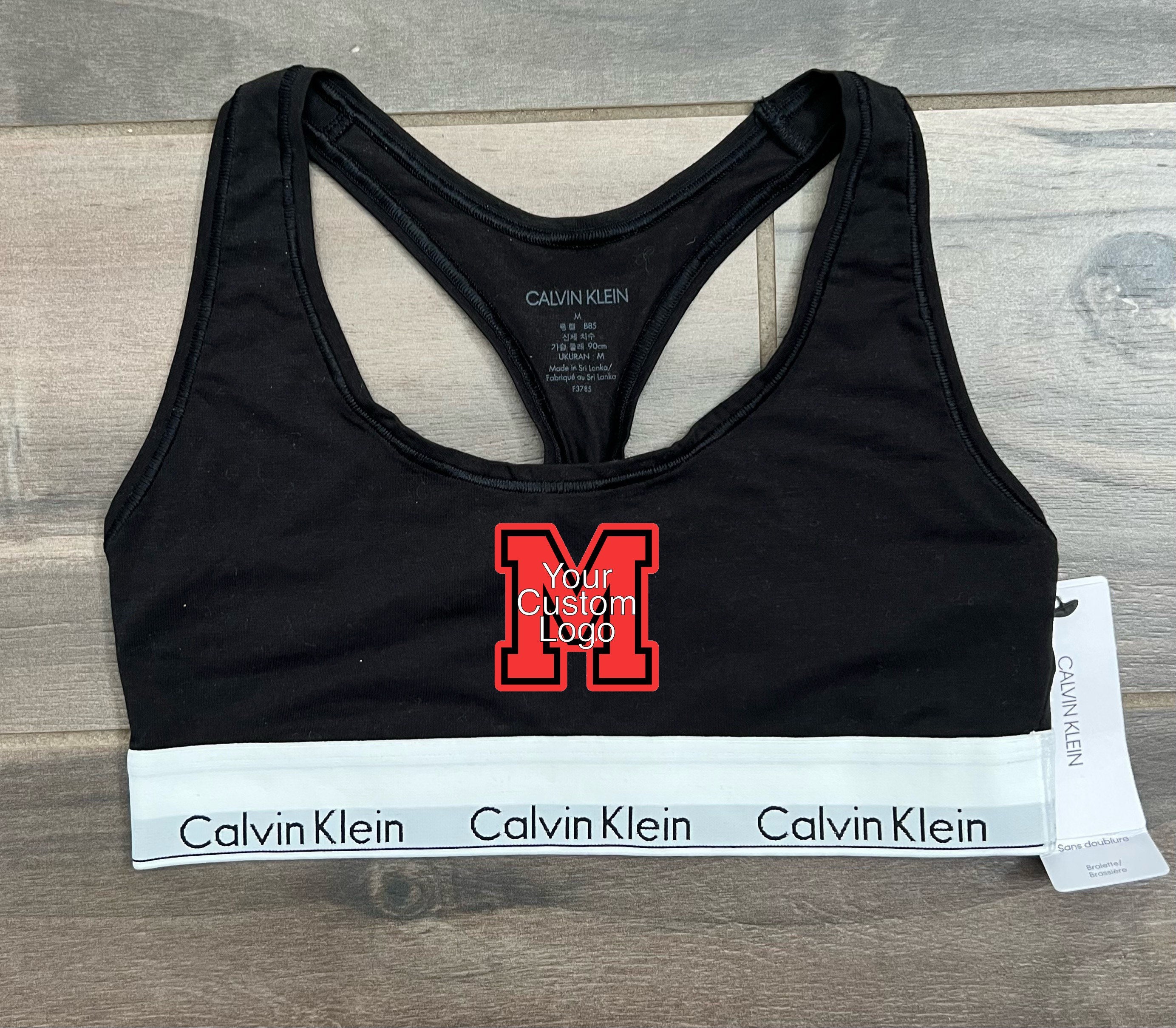 Calvin Klein Logo-lettering Sports Bra in Purple