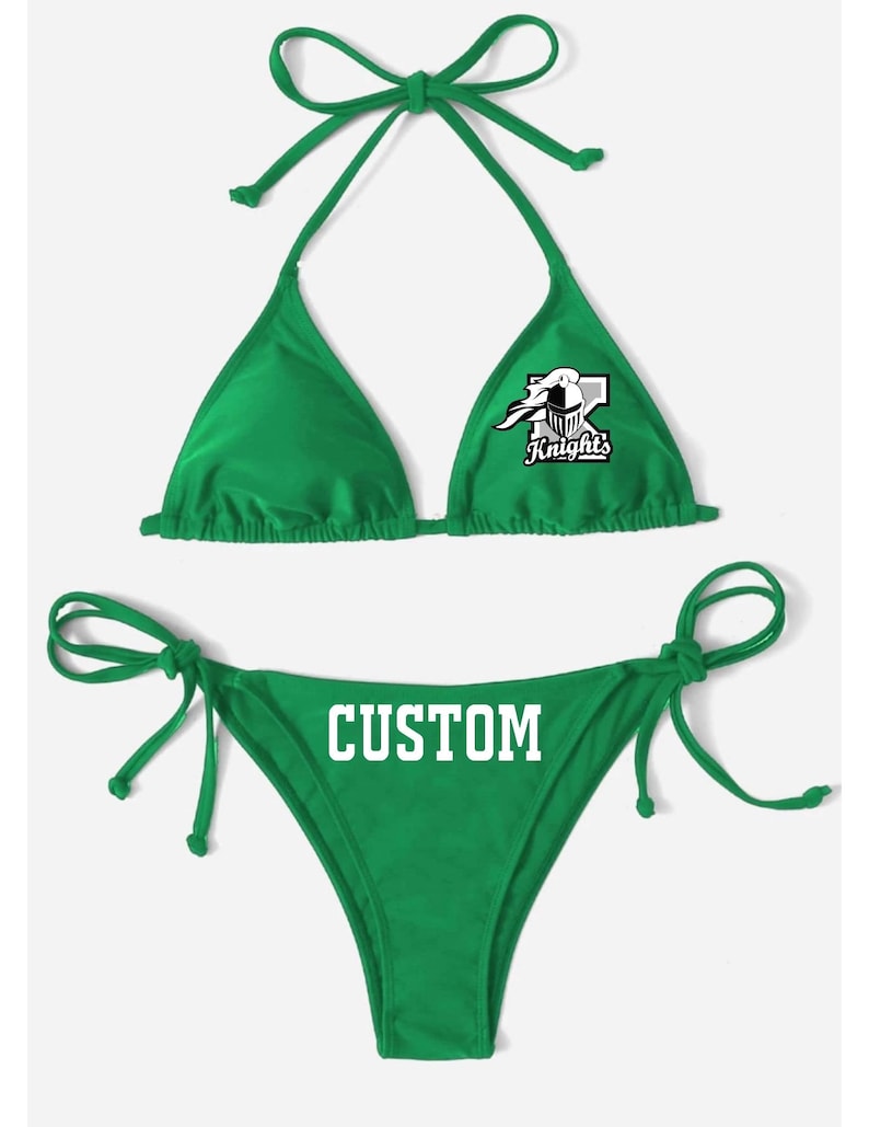 May include: Green bikini top and bottom with white text that says "CUSTOM" on the bottom and a white graphic of a knight on the top that says "Knight's".